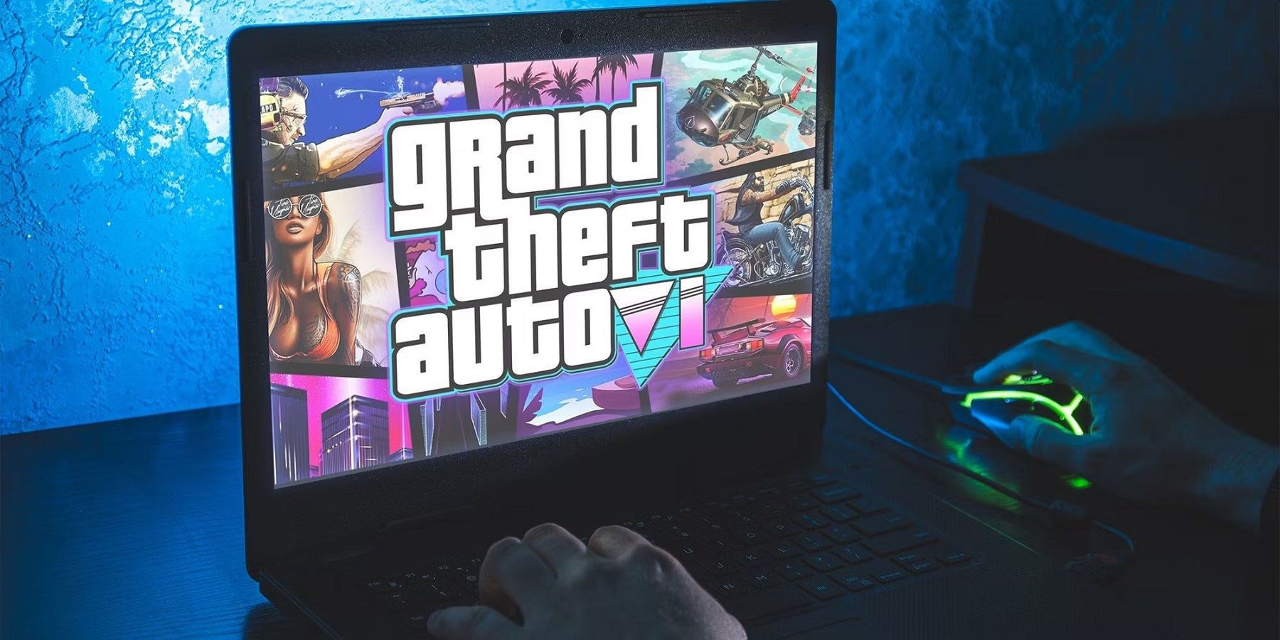 Photo of a laptop with a Grand Theft Auto 6-style image on the screen.